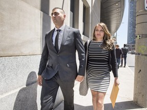 Peter Khill, accused of killing Jon Styres, leaves Hamilton's John Sopinka Courthouse with his wife  during a break in jury selection, Monday June 11, 2018. (Peter J. Thompson/Postmedia)