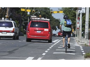 A cyclist heads north below Gerrard St. on Woodbine Ave. bike lanes a three-kilometre north/south from Kingston Rd. to O'Connor Dr. on Tuesday, September 12, 2017. (Jack Boland/Toronto Sun/Postmedia Network)