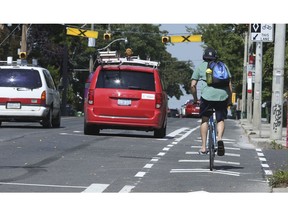 A cyclist heads north below Gerrard St. on Woodbine Ave. bike lanes a three-kilometre north/south from Kingston Rd. to O’Connor Dr. on Tuesday, September 12, 2017. (Jack Boland/Toronto Sun/Postmedia Network)