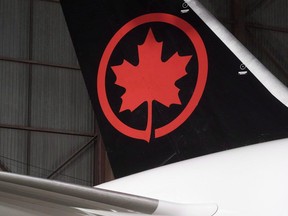 Air Canada logo seen at a hangar at Toronto Pearson International Airport. (THE CANADIAN PRESS)