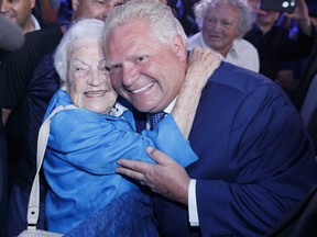 Premier-elect Doug Ford gets a hug from former Mississauga mayor Hazel McCallion. (THE CANADIAN PRESS)