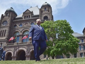 Ontario premier-elect Doug Ford walks out onto the front lawn of the Ontario Legislature at Queen's Park in Toronto on Friday, June 8, 2018. A spokesman for Doug Ford says Ontario's incoming premier is determined to deliver on his campaign promise to scrap the "disastrous" cap-and-trade system and fight a federal carbon tax. (THE CANADIAN PRESS)