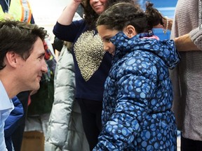 170129113011-prime-minister-trudeau-and-refugee-exlarge-169