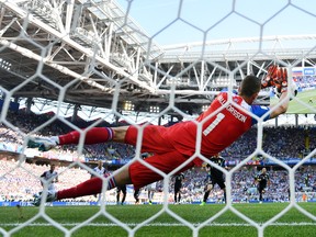 Iceland's Hannes Halldorsson saves a penalty kick from Argentina's Lionel Messi during their World Cup game on Saturday. (GETTY IMAGES)