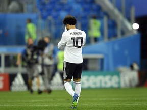 Egypt's Mohamed Salah leaves the pitch after Tuesday's loss to Russia.
 (AP PHOTO)