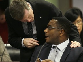 Mayor John Tory speaks with Councillor Michael Thompson at a committee meeting. (CRAIG ROBERTSON, Toronto Sun)