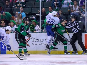 Marlies’ Mason Marchment hits the Stars’ Justin Dowling during Game 3 of the Calder Cup in Cedar Park, Texas, last night. (Texas Stars/photo)