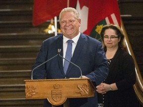 Doug Ford sworn in as premier of Ontario in Toronto, Ont. on Friday June 29, 2018. Craig Robertson/Toronto Sun