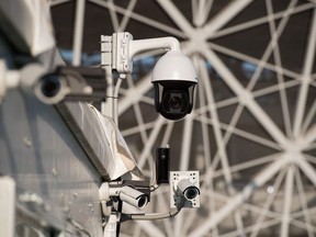 Security cameras are seen outside the Volgograd Arena in Volgograd on June 16, 2018, during the Russia 2018 World Cup football tournament.