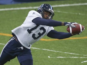 Toronto Argonauts Mario Alford (13) hauls in a pass at practice as he prepares for their Thursday pre-season game at practice in Vaughan Monday, June 4, 2018. (Jack Boland/Toronto Sun)