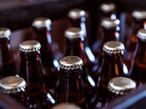 Crate with full beer bottles