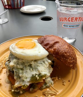 The scrumptious chilaquiles burger at Burgerteca. LING HUI/POSTMEDIA NETWORK