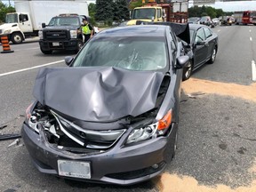 Damage to a vehicle after it hit a stopped Mercedes, then was struck from behind by a third vehicle on Hwy. 401 westbound at Hwy. 400 on Friday, June 22, 2018. (Kerry Schmidt/Twitter)