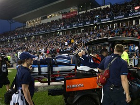 Toronto Argonauts quarterback Ricky Ray is taken off the field with an injury during the second half of CFL football game action against the Calgary Stampeders at BMO Field in Toronto on Saturday June 23, 2018. (THE CANADIAN PRESS/Cole Burston)