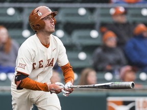 Texas' Kody Clemens watches his home run against Baylor during an NCAA college baseball game in Austin, Texas on April 7, 2018. (Nick Wagner/Austin American-Statesman via AP)