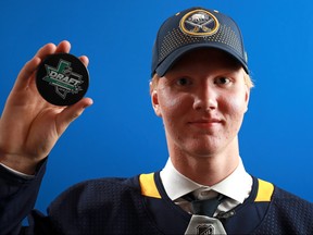 Rasmus Dahlin poses after being selected first overall by the Buffalo Sabres during the first round of the 2018 NHL Draft at American Airlines Center on June 22, 2018 in Dallas, Texas.  (TOM PENNINGTON/Getty Images)