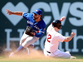 Brock Holt of the Boston Red Sox steals second past Devon Travis of the Toronto Blue Jays at Fenway Park on May 30, 2018 in Boston. (Maddie Meyer/Getty Images)