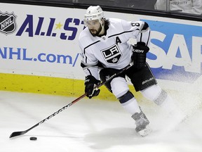 In this Dec. 23, 2017, file photo, Los Angeles Kings defenceman Drew Doughty works with the puck against the San Jose Sharks in San Jose, Calif. (AP Photo/Marcio Jose Sanchez, File)