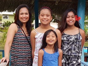 Murder victim Rhoderie Estrada is seen here with her three daughters -- Jazmine, 14, Alexandra, 12, and Zoie, 10. (GoFundMe)