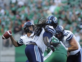 Toronto Argonauts quarterback Ricky Ray looks for a receiver during first half season opener CFL action against the Saskatchewan Roughriders at Mosaic Stadium in Regina on Friday THE CANADIAN PRESS/Mark Taylor)