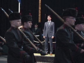 Prime Minister Justin Trudeau has called a byelection for the Quebec riding of Chicoutimi-Le Fjord, only days after pledging $60 million in federal funding for an aluminum-smelting project in the area. Prime Minister Trudeau stands as the troops of the Voltigeurs de Quebec parade, in Quebec City on Saturday, May 12, 2018.