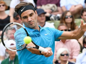 Switzerland's Roger Federer returns the ball to Canada's Milos Raonic during the final match at the ATP Mercedes Cup tennis tournament in Stuttgart, southwestern Germany, on June 17, 2018.