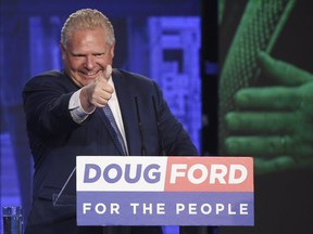 Ontario PC leader Doug Ford reacts after winning the Ontario Provincial election to become the new premier in Toronto, on Thursday, June 7, 2018. (THE CANADIAN PRESS/Nathan Denette)