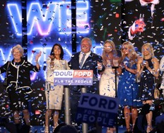 Ontario's Premier Doug Ford with his family on stage after addressing his supporters at the Toronto Congress Centre on Thursday June 7, 2018. Jack Boland/Toronto Sun/Postmedia Network