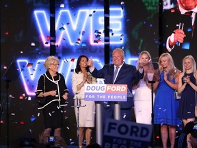 Ontario's Premier Doug Ford with his family on stage after addressing his supporters at the Toronto Congress Centre   on Thursday June 7, 2018. Jack Boland/Toronto Sun/Postmedia Network