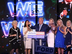 Ontario's Premier Doug Ford with his family on stage.