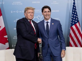 Prime Minister Justin Trudeau meets with U.S. President Donald Trump at the G7 leaders summit in La Malbaie, Que., on Friday, June 8, 2018. THE CANADIAN PRESS/Justin Tang