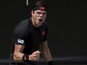 Milos Raonic reacts at the quarterfinal match against Tomas Berdych during the ATP Mercedes Cup in Stuttgart, Friday June 15, 2018. (Marijan Murat/dpa via AP)