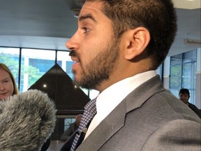 Shakir Rahim, one of the four members of the Missing Persons Investigations Review Working Group, following Thursday’s Toronto Police Services Board meeting at police headquarters. (Jenny Yuen/Toronto Sun)