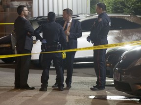 Toronto Police investigate a recent double killing on Lightwood Dr. (JOHN HANLEY PHOTO)