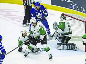 Toronto Marlies Trevor Moore bottom left) scores the game winner in the third period of the Calder Cup final Game 1 in Toronto on Saturday June 2, 2018. Jack Boland/Toronto Sun