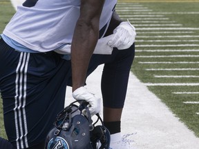S.J. Green looks on from the sidelines during Argonauts practice on Wednesday. (Stan Behal/Toronto Sun)