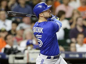 Randal Grichuk of the Toronto Blue Jays hits a two-run home run in the eighth inning against the Houston Astros at Minute Maid Park on June 25, 2018. (Bob Levey/Getty Images)