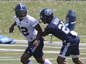 T.J Heath (right ) participates in Argonauts practice. (Veronica Henri/Toronto Sun)