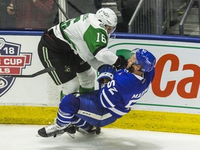 Martin Marincin of the Toronto Marlies is hit by Curtis McKenzie of the Texas Stars during Game 6 of the Calder Cup Finals at Ricoh Coliseum on June 12, 2018