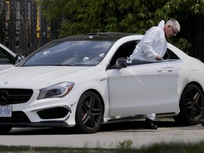 Toronto Police at the scene of a shooting involving officers at Hymus Road and Warden Avenue on Thursday, June 7, 2018. (Ernest Doroszuk/Toronto Sun)