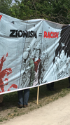 One of numerous anti-Zionist banners flown during an al-Quds day rally at Queen’s Park in Toronto, Ont. on Saturday, June 9 2018. Joe Warmington/Toronto Sun