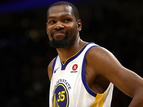 Kevin Durant of the Golden State Warriors reacts against the Cleveland Cavaliers during Game 3 of the NBA Finals at Quicken Loans Arena on June 6, 2018
