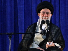 In this picture released by an official website of the office of the Iranian supreme leader, Supreme Leader Ayatollah Ali Khamenei attends a ceremony marking the 29th anniversary of the death of the late revolutionary founder Ayatollah Khomeini, at his mausoleum, just outside Tehran, Iran, Monday, June 4, 2018.  (Office of the Iranian Supreme Leader via AP)