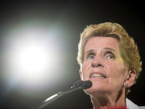 Former Ontario Premier Kathleen Wynne announces to supporters that she is stepping away from her Liberal seat during her election night party at York Mills Gallery on Thursday, June 7, 2018. THE CANADIAN PRESS/ Tijana Martin