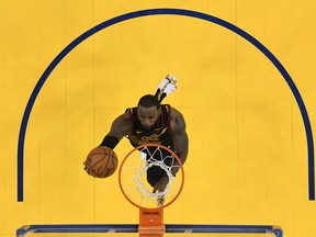 LeBron James of the Cleveland Cavaliers goes up for a layup against the Golden State Warriors in Game 1 of the NBA Finals at ORACLE Arena on May 31, 2018 in Oakland, Calif. (GETTY IMAGES)