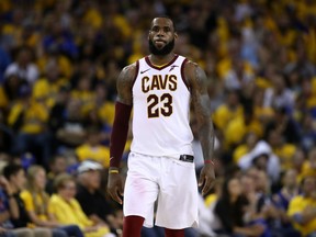 LeBron James #23 of the Cleveland Cavaliers reacts against the Golden State Warriors during the third quarter in Game 2 of the 2018 NBA Finals at ORACLE Arena on June 3, 2018 in Oakland, California.