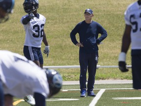 Marc Trestman watches his Argos prepare for Saturday’s home opener, a Grey Cup rematch against Calgary. (STAN BEHAL/TORONTO SUN)