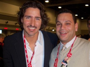 Canadian Prime Minister Justin Trudeau, left. poses with Vancouver-East riding chair Mark Elyas. Facebook photo