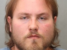 Michael Tracey, 29, charged in a Toronto Police voyeurism investigation. Police concerned there may be other victims.