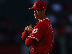 Shohei Ohtani of the Los Angeles Angels pitches during the first inning of a game against the Kansas City Royals at Angel Stadium on June 6, 2018